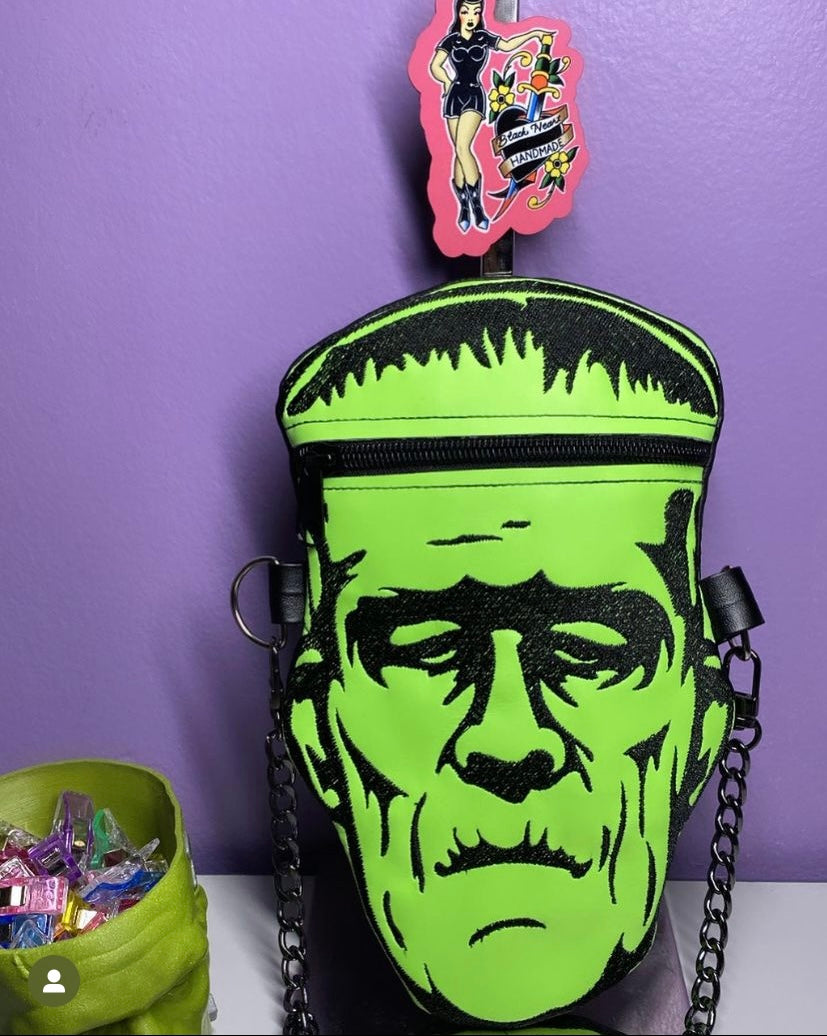 Embroidered Frank head mini crossbody bag